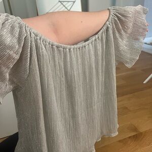 A silver going out top!